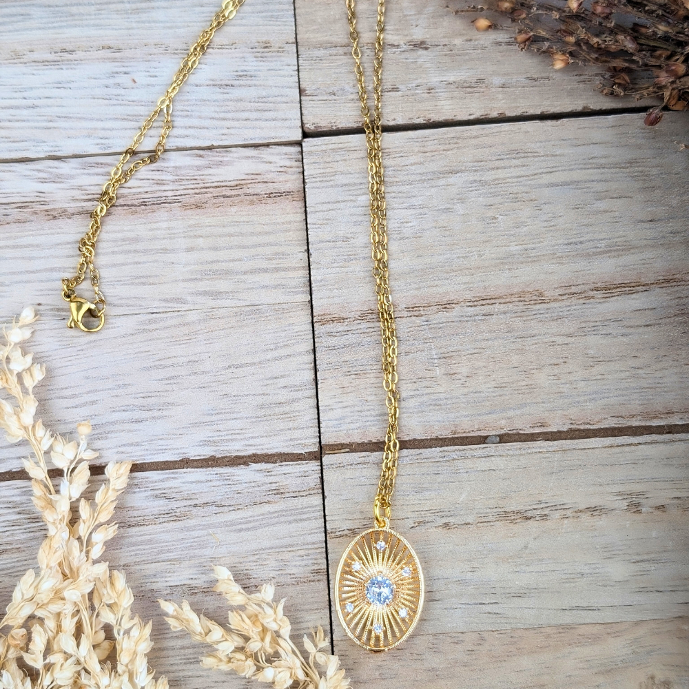 Celestial sunburst necklace, metaphysical jewelry for inner strength and light.