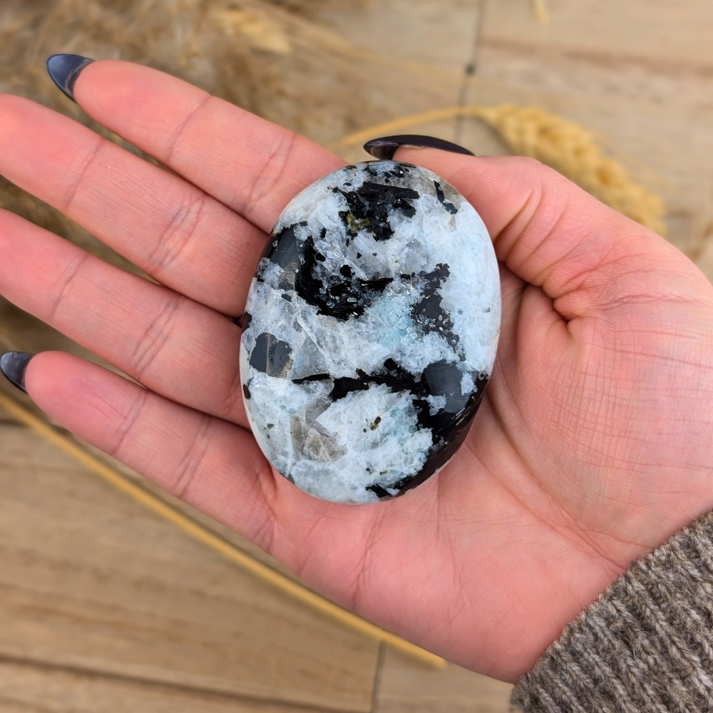 Meditation with Rainbow Moonstone Palm Stone for healing