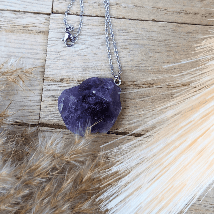 Raw Amethyst Necklace featuring a natural purple stone