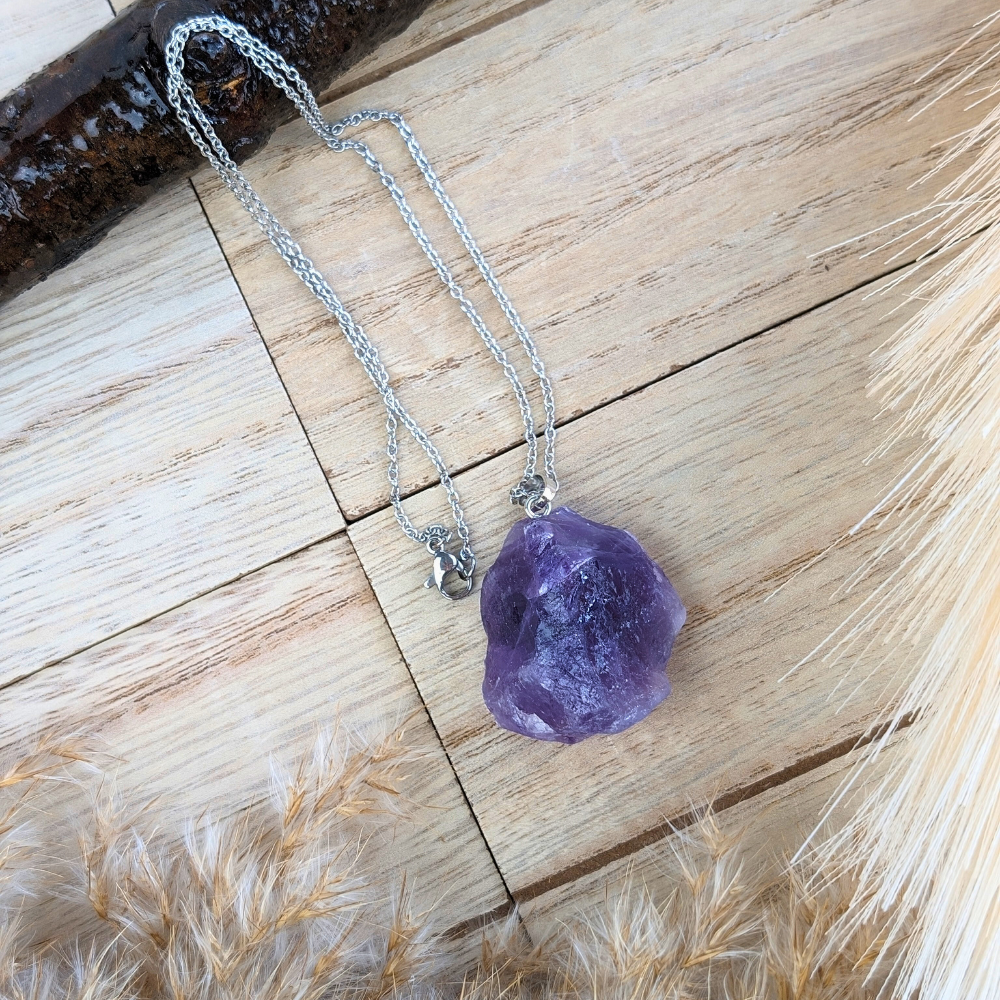 Raw Amethyst Necklace with silver-tone chain.