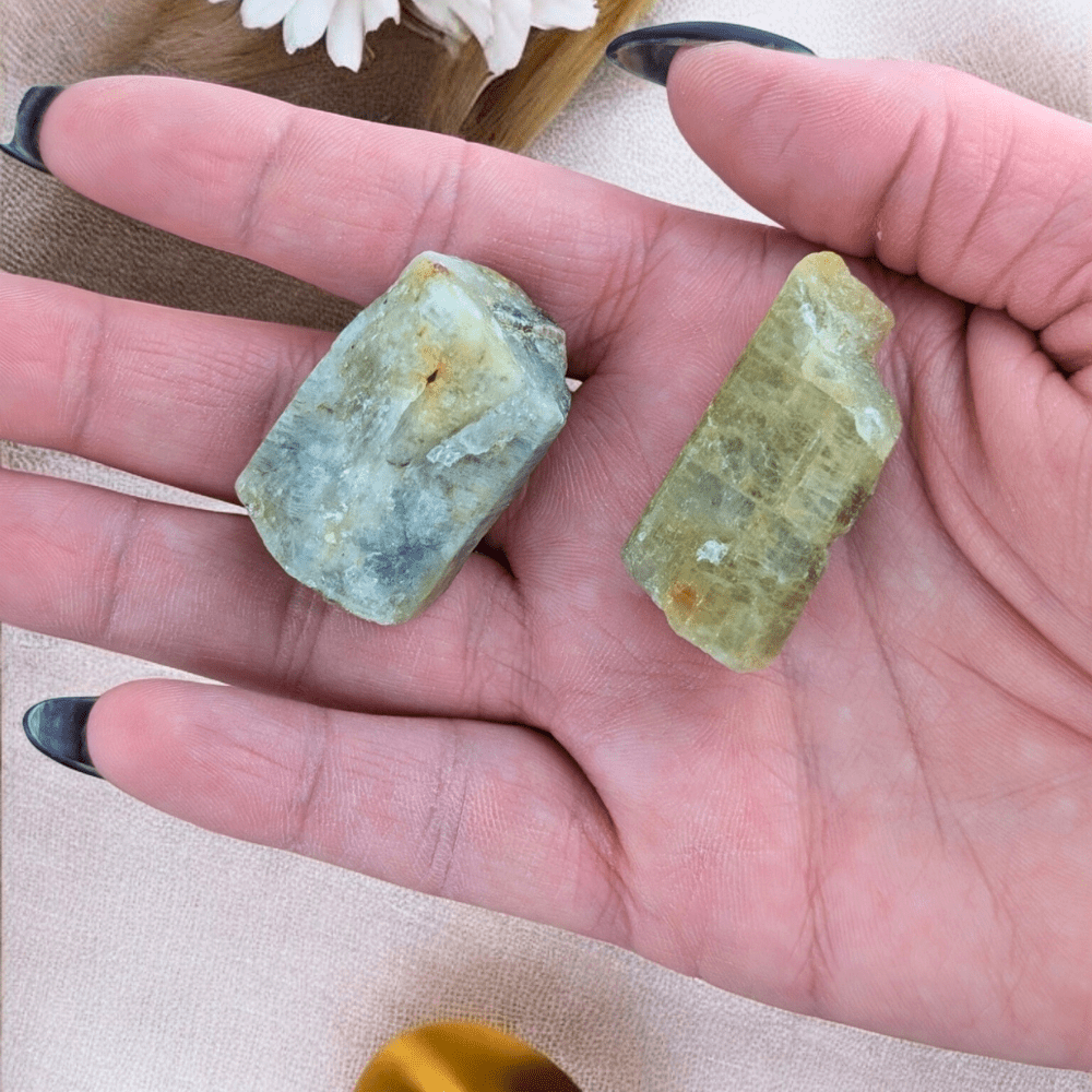 Close-up of raw aquamarine crystals with organic textures.