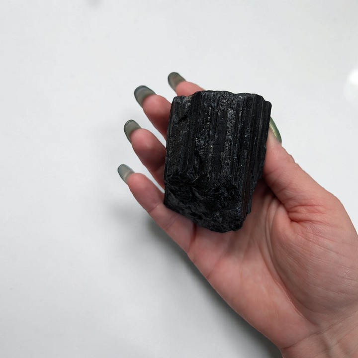 Raw Black Tourmaline Crystal for the root chakra and negative energy protection. Find in-store now or online at Zen Collection Metaphysical Store Canada