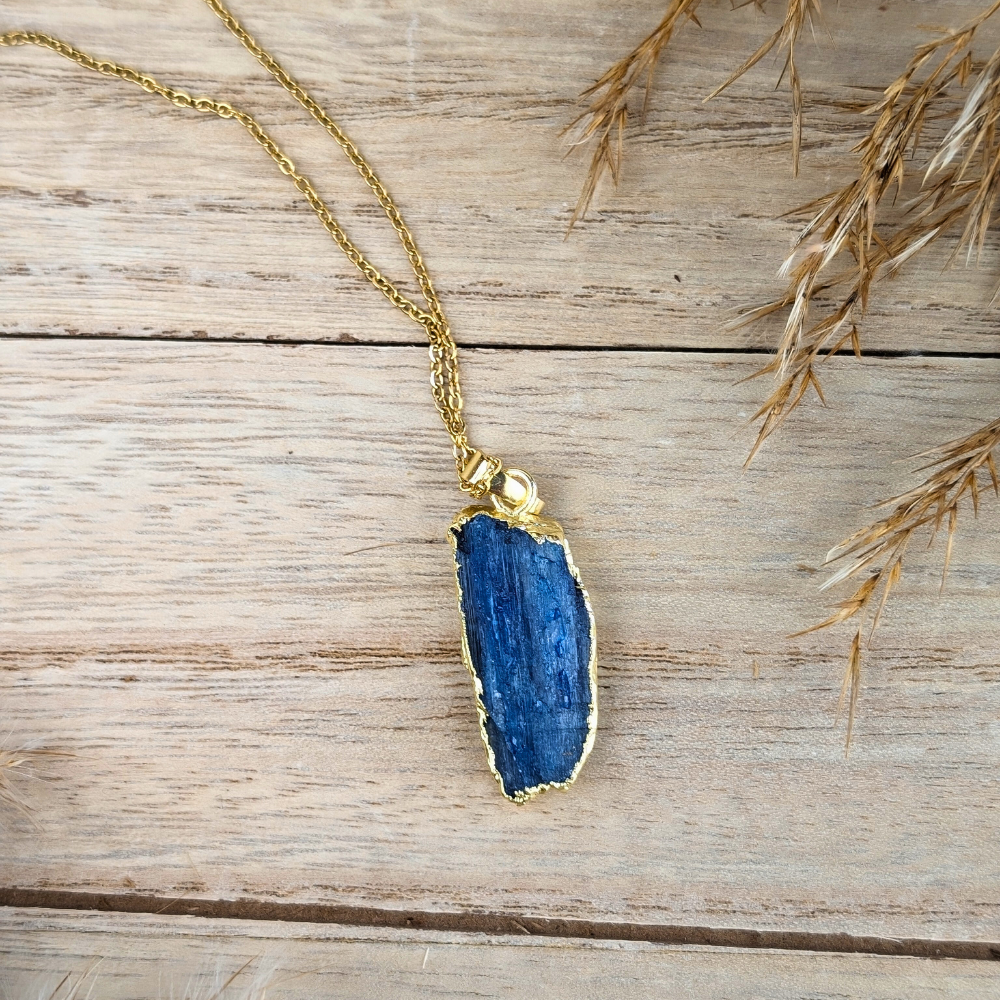 Raw Kyanite Necklace with a natural stone pendant and gold-tone chain