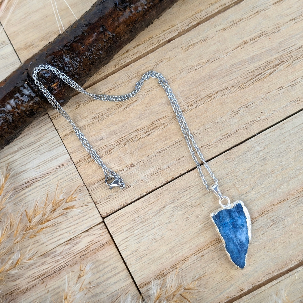 Raw Kyanite Necklace with a silver chain for dream recall and balance