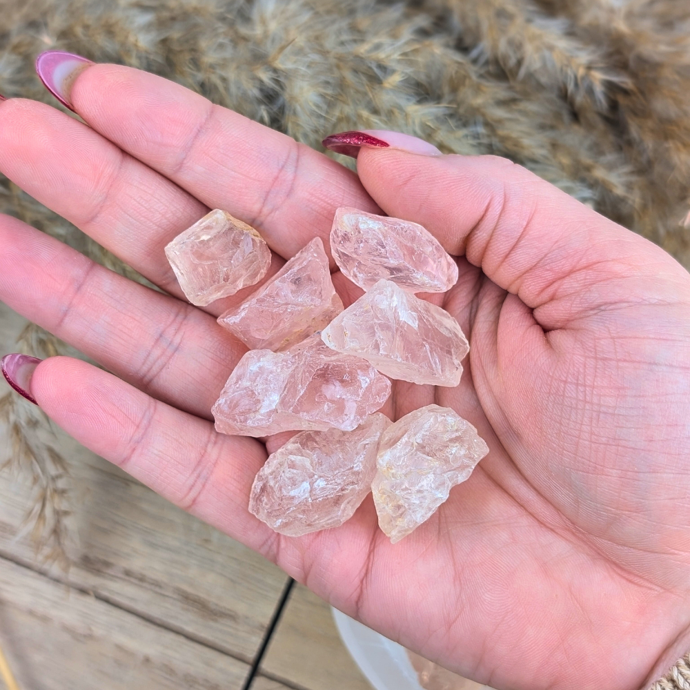 Ethically sourced raw rose quartz crystals from Brazil for love energy.