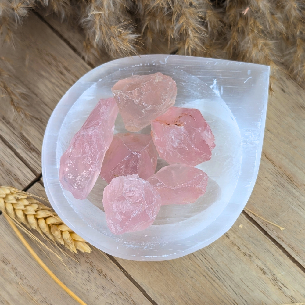 Natural rose quartz crystals for meditation and energy work.