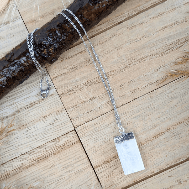 Minimalist selenite necklace close-up