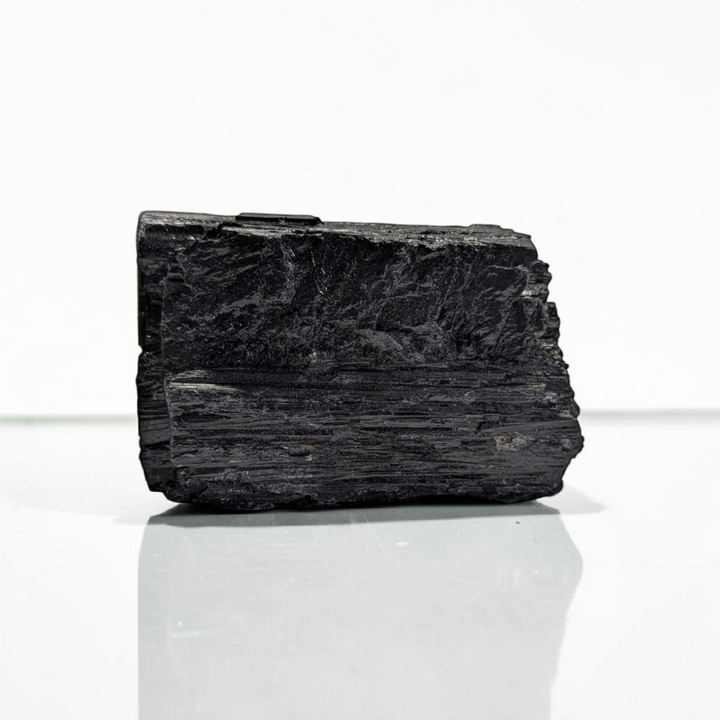 black stone for protection and crystal for the root chakra. Use for shadow and energy work. Find black tourmaline crystals in-store or online now at Zen Collection Metaphysical Store Canada