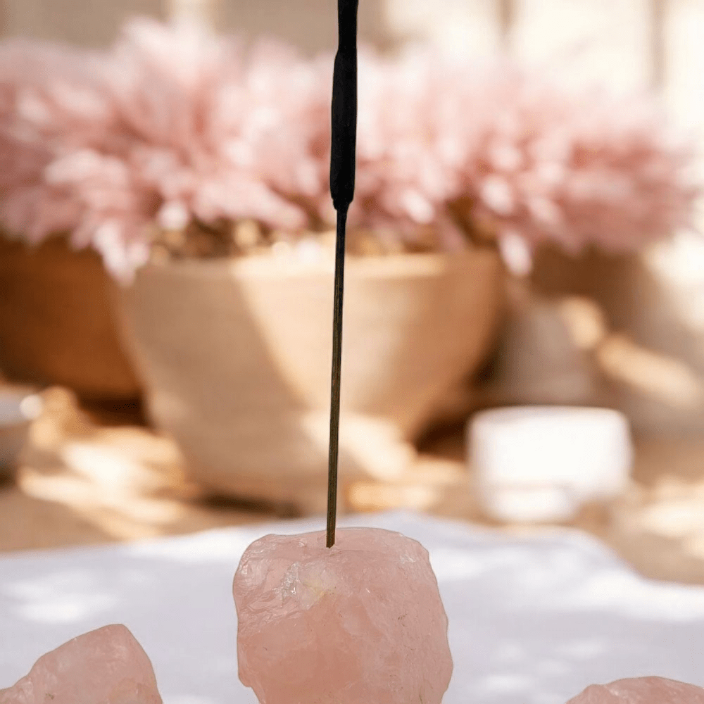 Raw rose quartz incense holder from Zen Collection