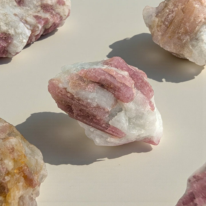 Pink tourmaline crystal for grief and emotional support available at zen collection crystal store