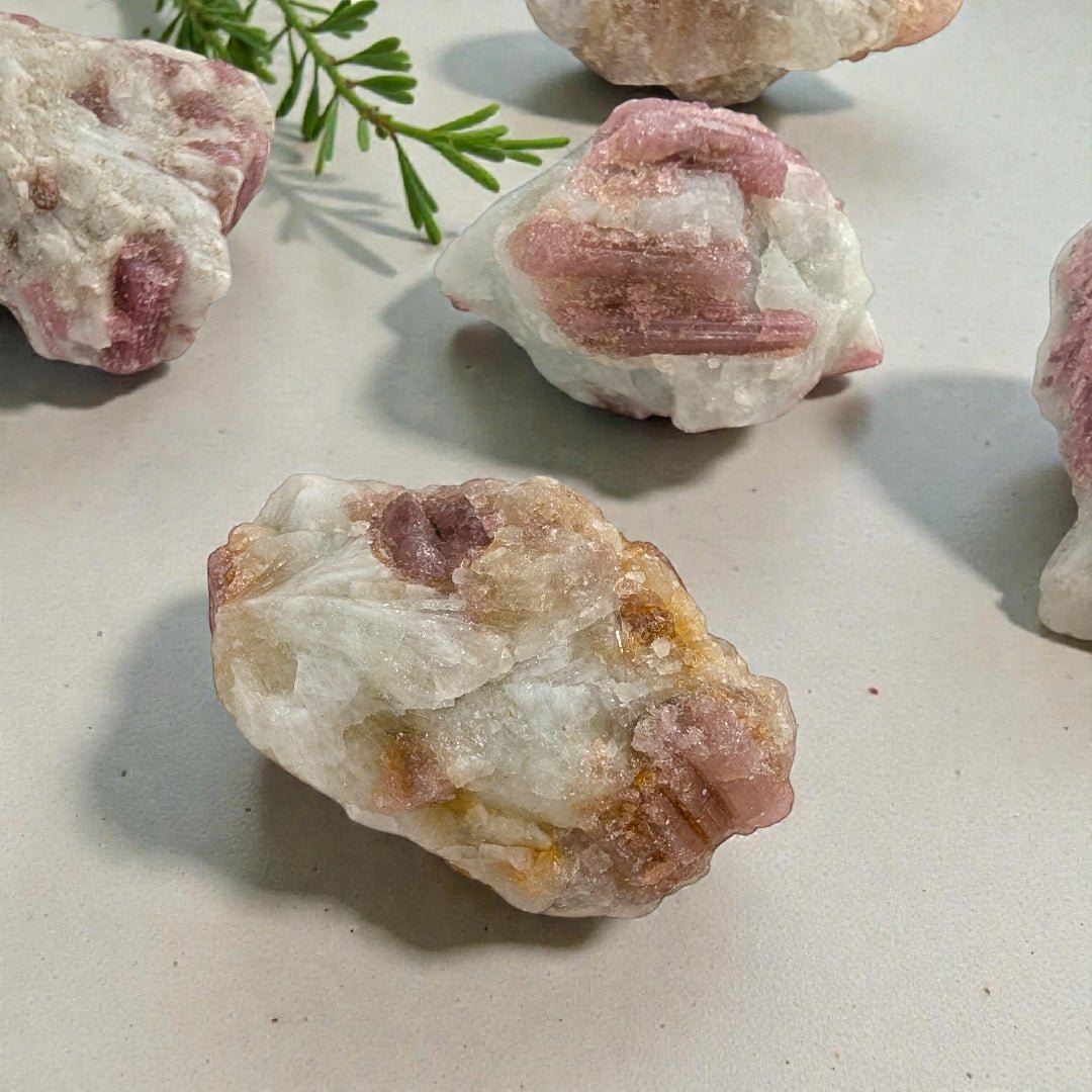 Pink tourmaline crystal for grief and emotional support available at zen collection crystal store