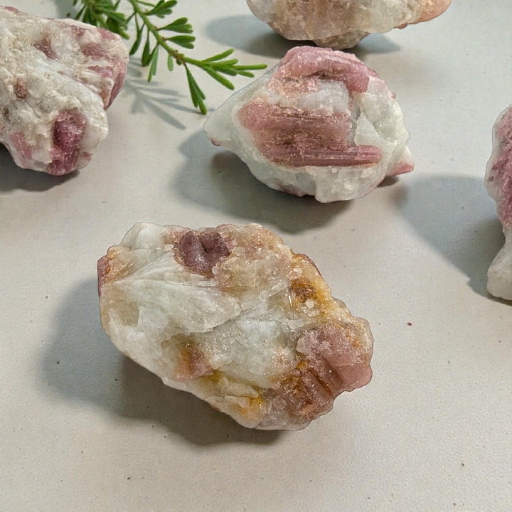 Pink tourmaline crystal for grief and emotional support available at zen collection crystal store