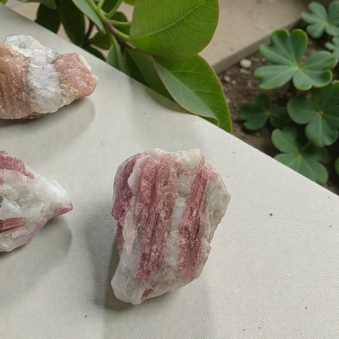 Pink tourmaline crystal for grief and emotional support available at zen collection crystal store