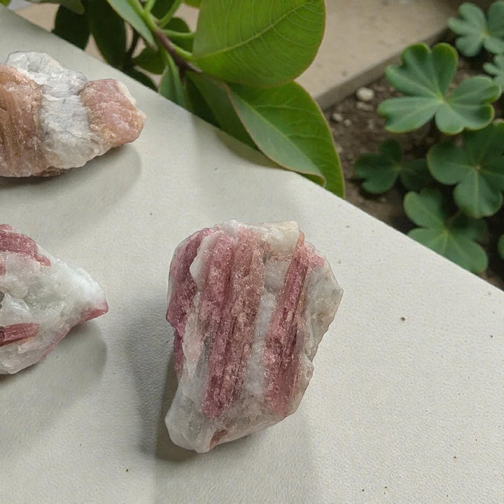 Pink tourmaline crystal for grief and emotional support available at zen collection crystal store