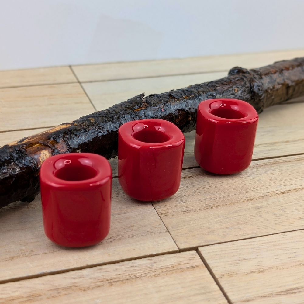 Mini chime candle holder in vibrant red for passion-focused rituals