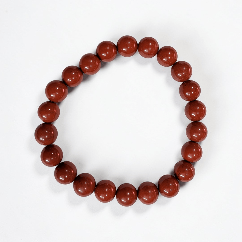 Red jasper stretch bracelet for strength and grounding the root chakra. Available at Zen Collection Metaphysical Store in Barrie