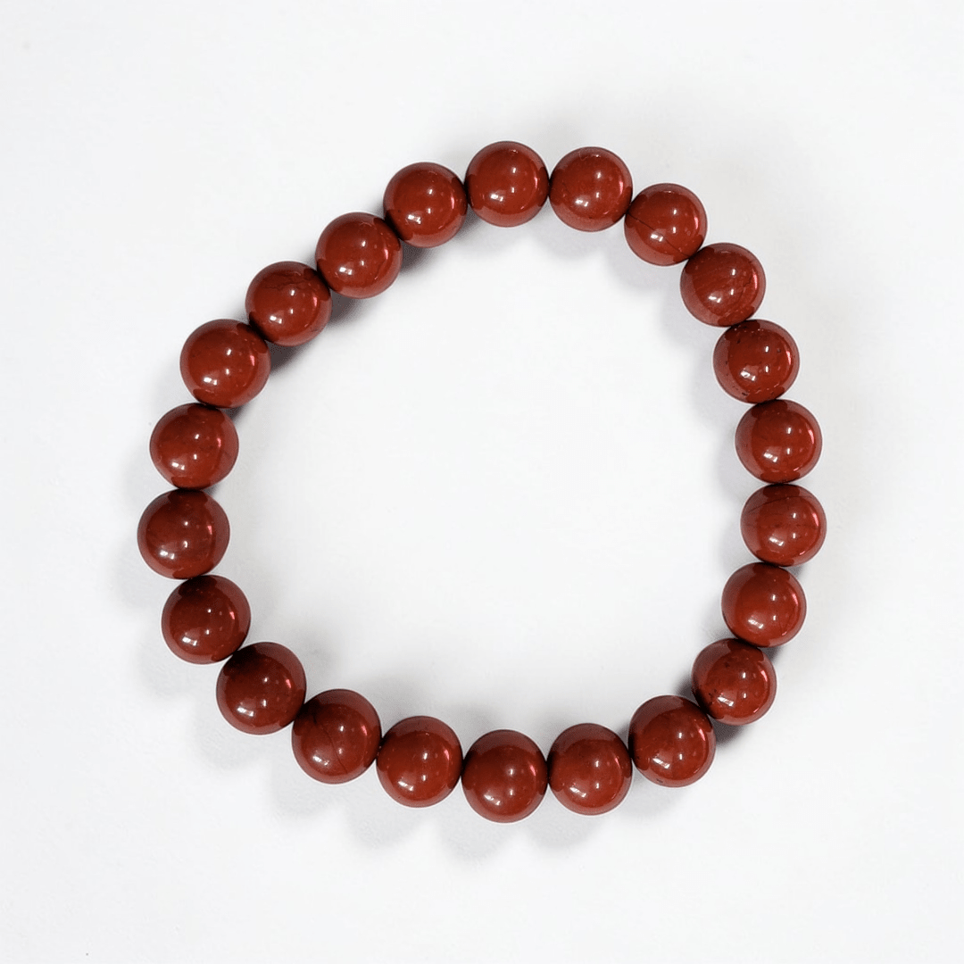 Red jasper stretch bracelet for strength and grounding the root chakra. Available at Zen Collection Metaphysical Store in Barrie