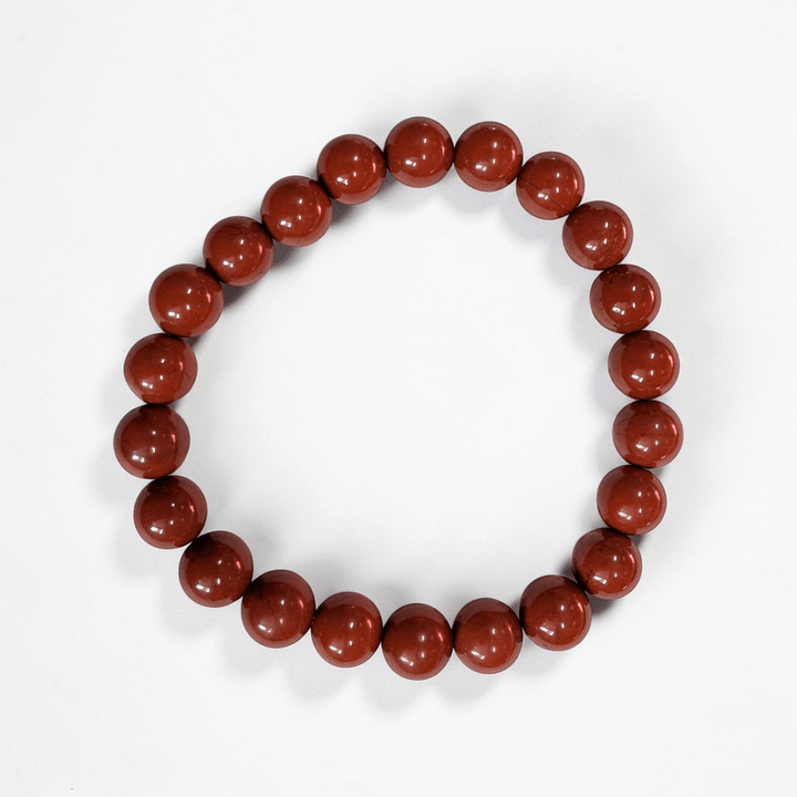 Red jasper stretch bracelet for strength and grounding the root chakra. Available at Zen Collection Metaphysical Store in Barrie
