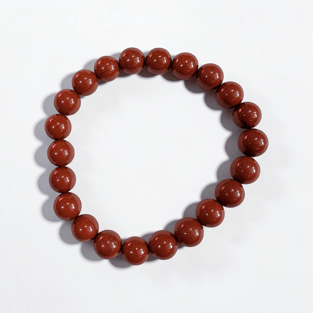 Red jasper stretch bracelet for strength and grounding the root chakra. Available at Zen Collection Metaphysical Store in Barrie