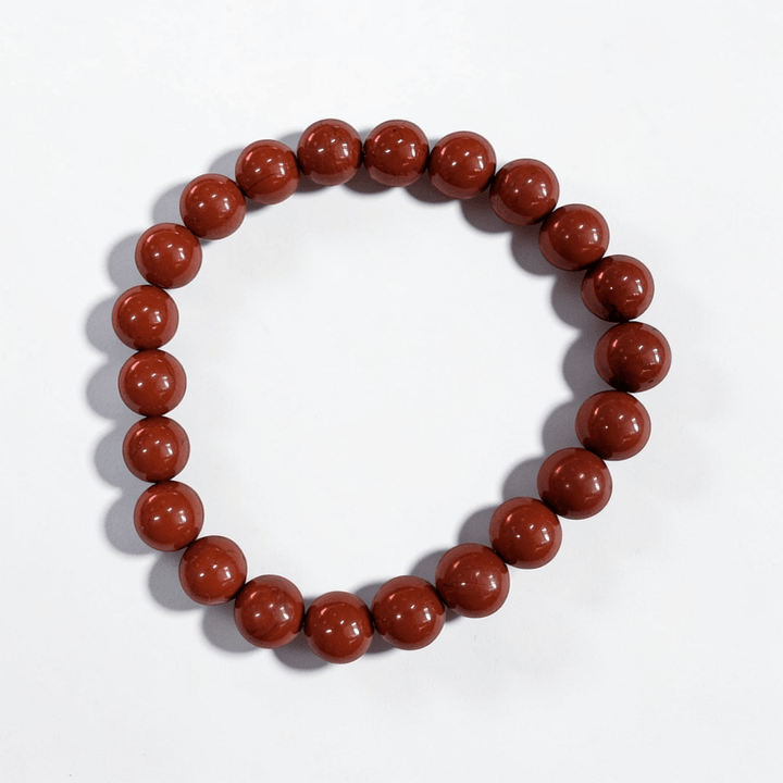 Red jasper stretch bracelet for strength and grounding the root chakra. Available at Zen Collection Metaphysical Store in Barrie