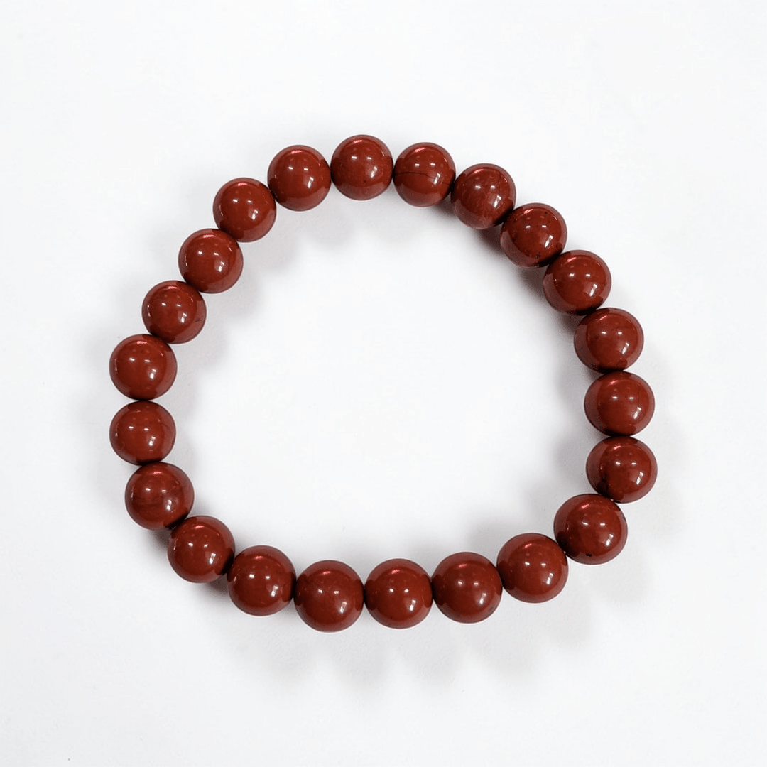 Red jasper stretch bracelet for strength and grounding the root chakra. Available at Zen Collection Metaphysical Store in Barrie