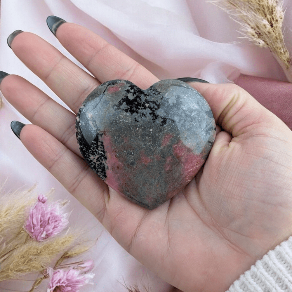 Cleansed and charged Rhodonite crystal under the full moon