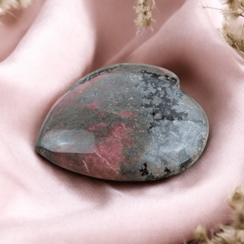 Polished Rhodonite heart for self-love and relationship harmony