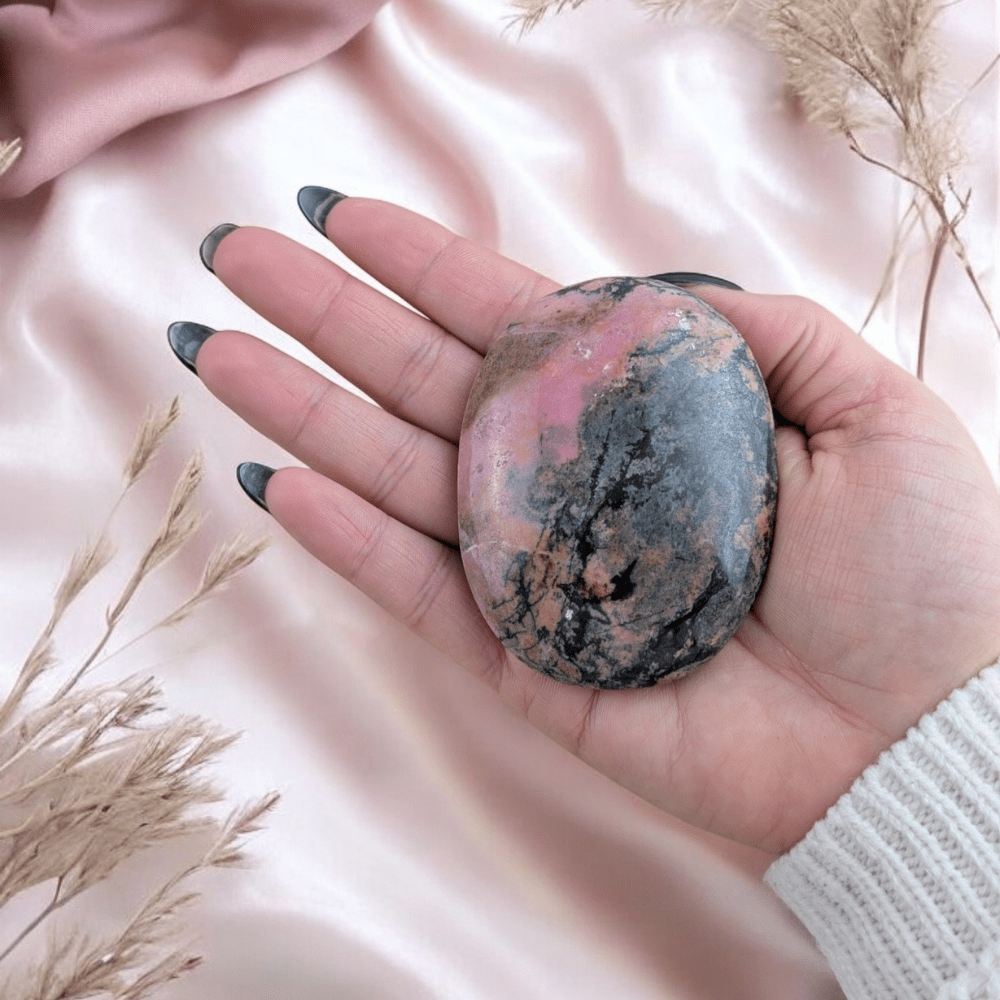 Cleansed and charged Rhodonite Palm Stone for energy healing