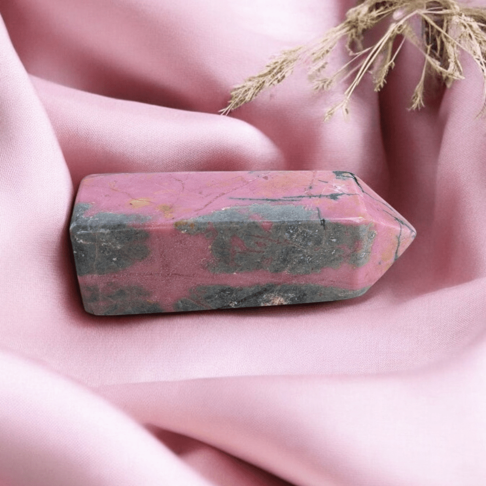 Pink and black Rhodonite healing crystal for balance