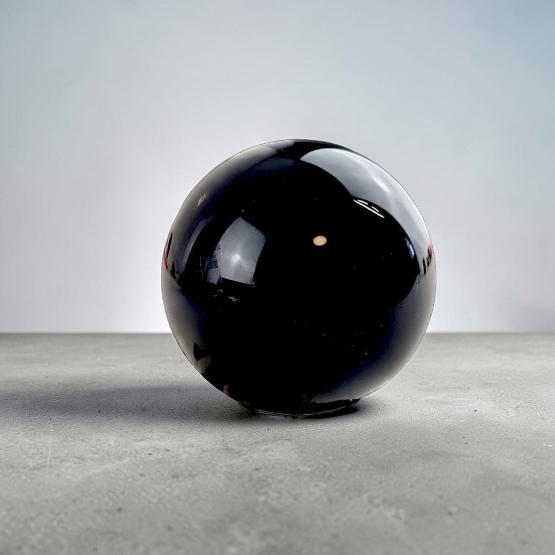 Root Chakra Black obsidian sphere for shadow healing available at Zen Collection metaphysical supply store