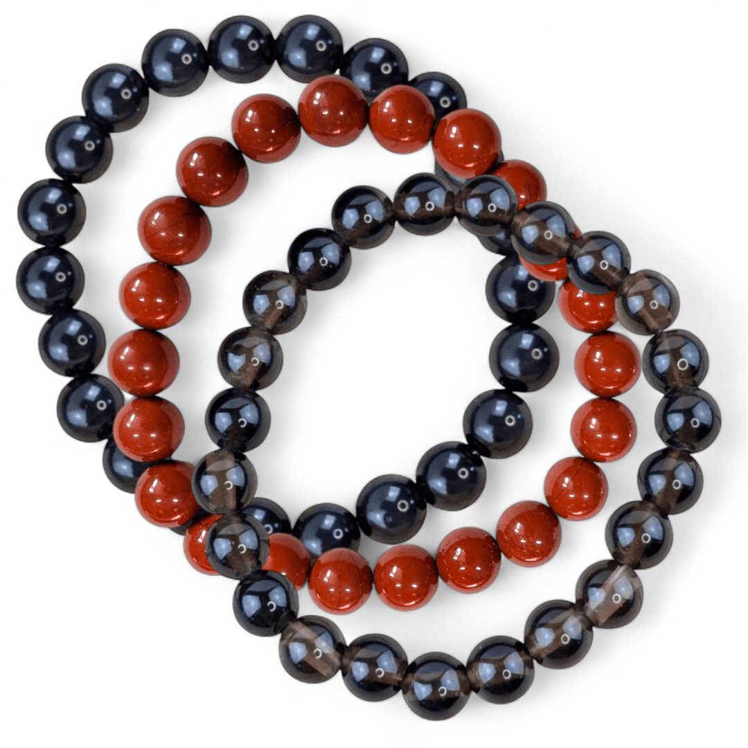 Root chakra crystal bracelet stack with smoky quartz red jasper and black obsidian. Shop in-store or online now with Zen Collection Metaphysical Store Barrie