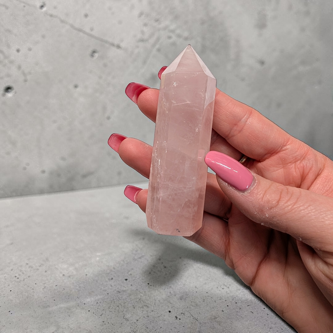 Soft pink rose quartz obelisk for emotional clarity and spiritual connection.