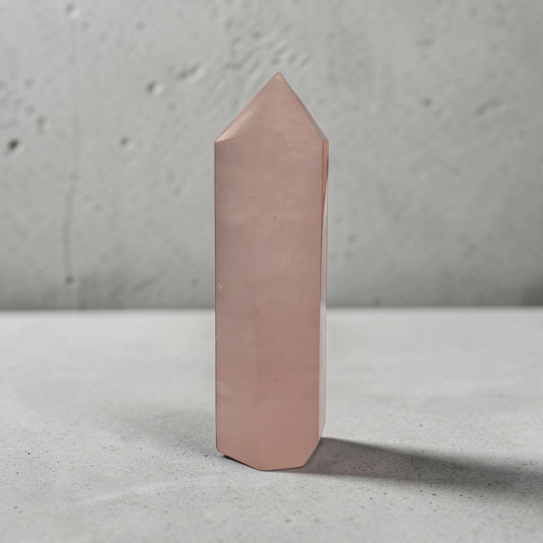 Heart chakra-focused rose quartz obelisk for spiritual growth.