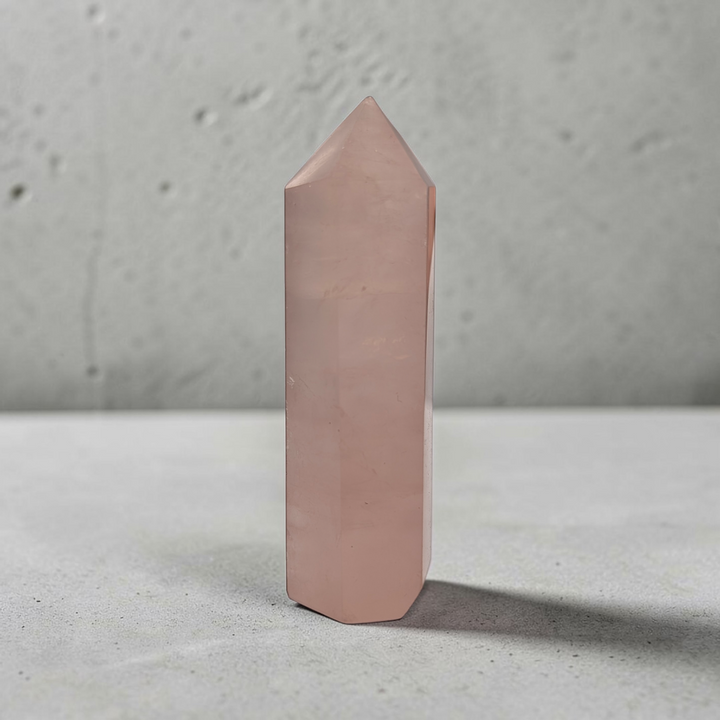 Heart chakra-focused rose quartz obelisk for spiritual growth.
