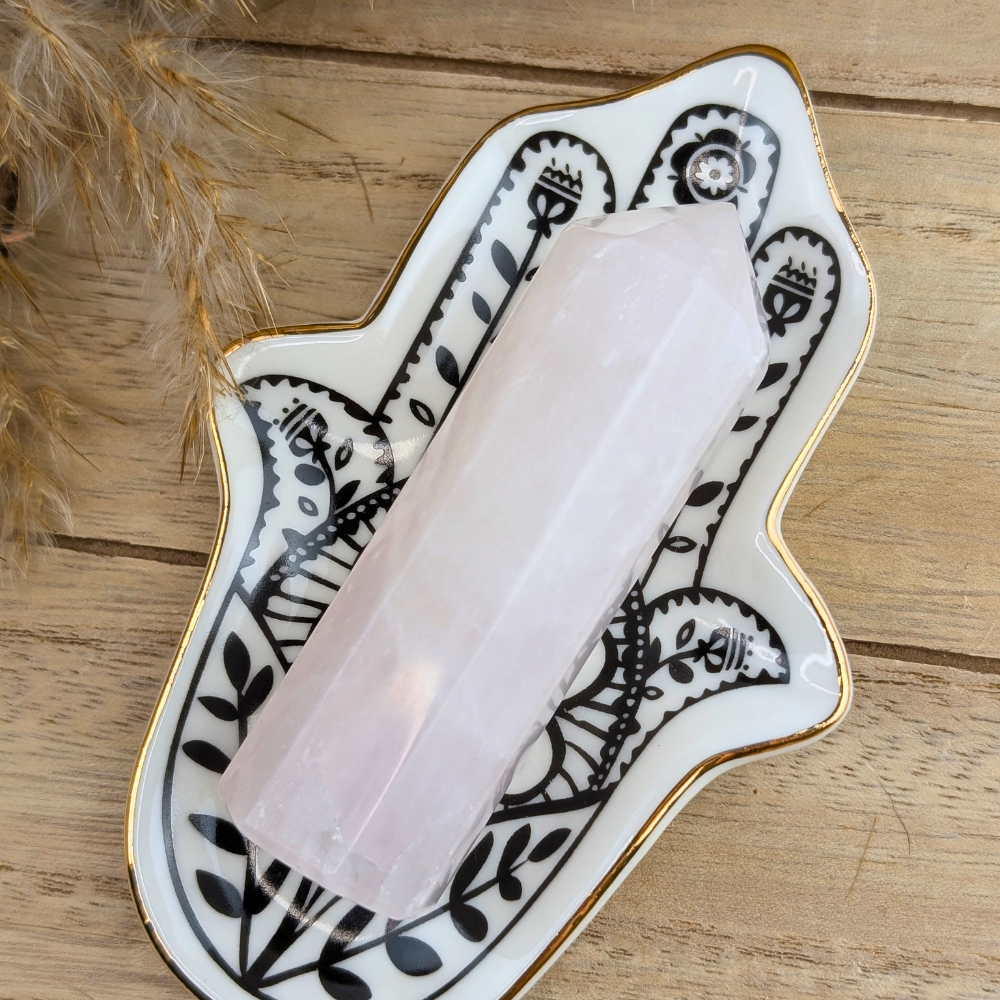 Rose quartz obelisk for self-healing and compassion practices.