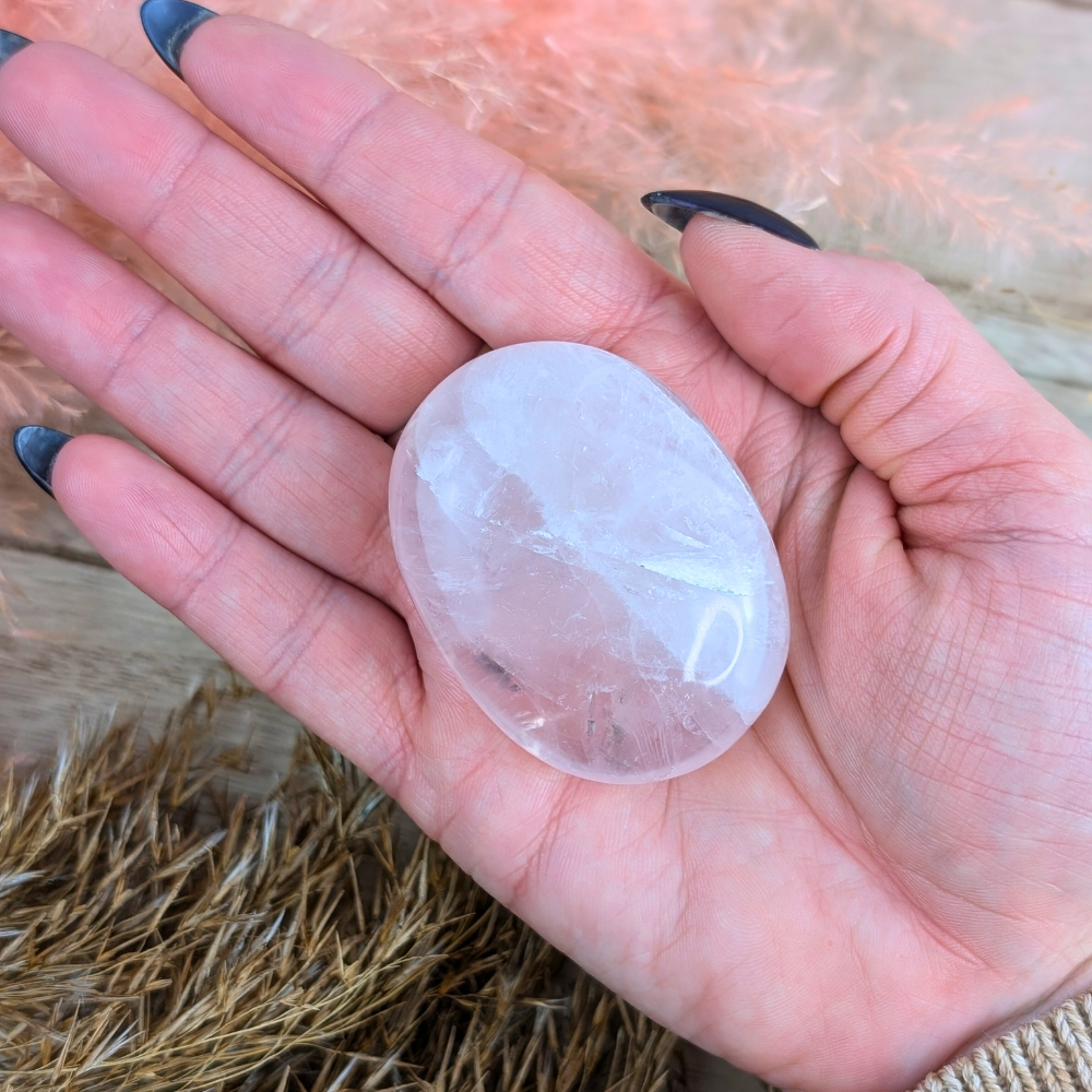 Smooth Rose Quartz Palm Stone as a heart chakra healing tool