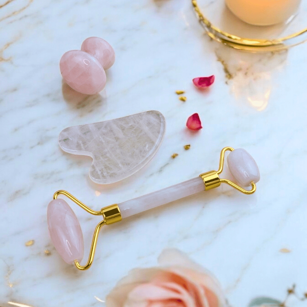 Self-care tools crafted from natural rose quartz.