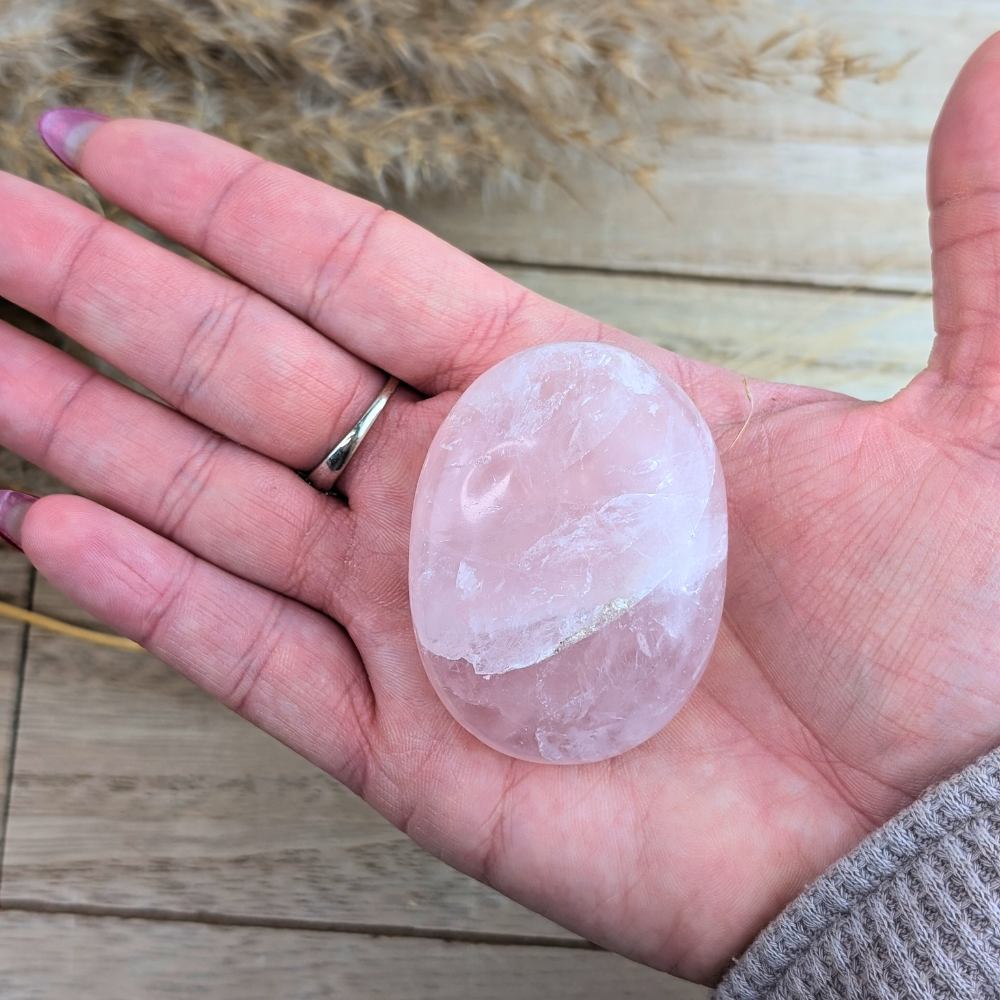 Hand-polished rose quartz stone for self-love and heart chakra alignment.