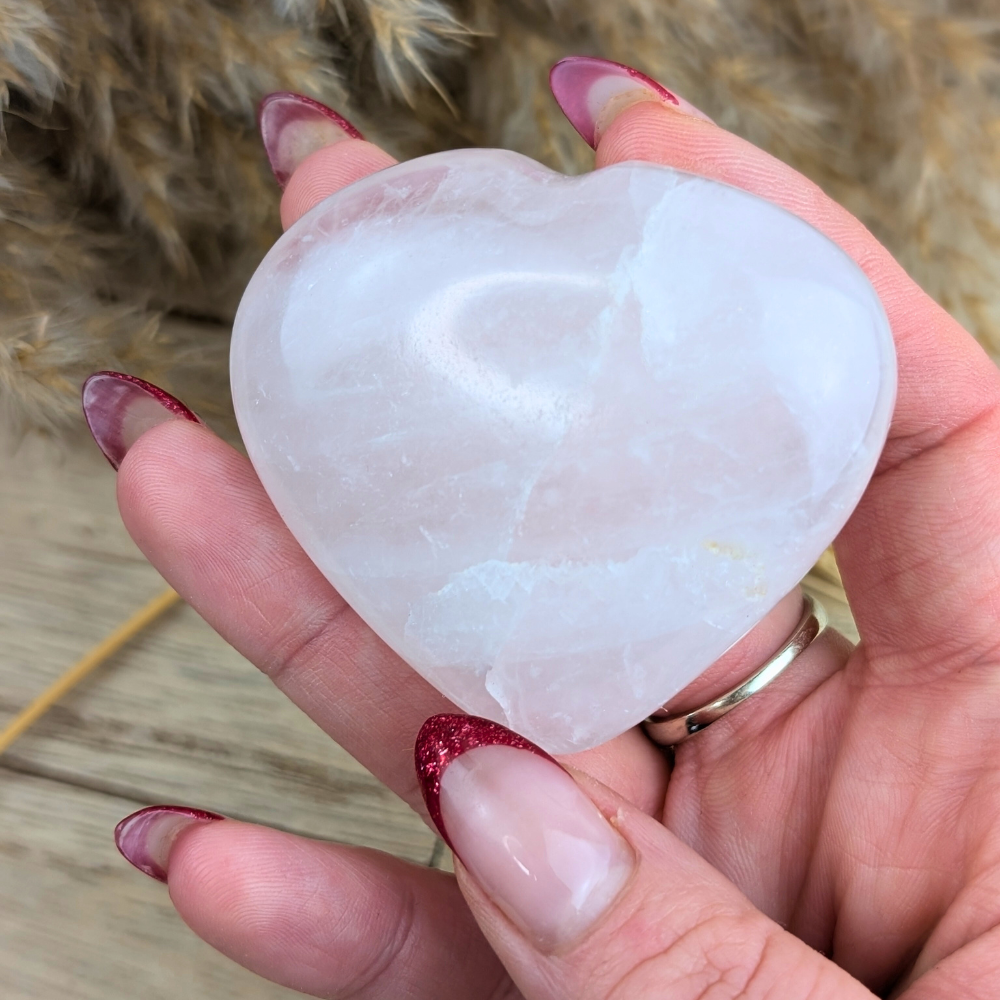 Rose quartz heart for Anahata Chakra alignment and spiritual connection.