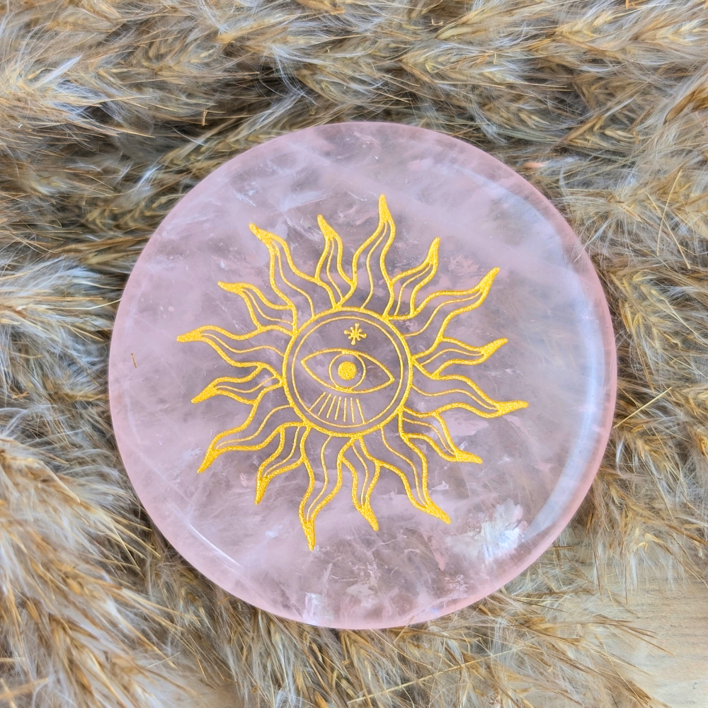 Rose Quartz Engraved Protection Plate with golden sun and eye design for chakra healing.