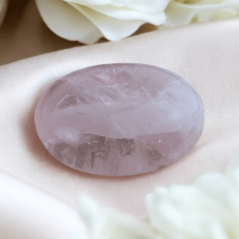 Open the heart chakra with a Rose Quartz palm stone