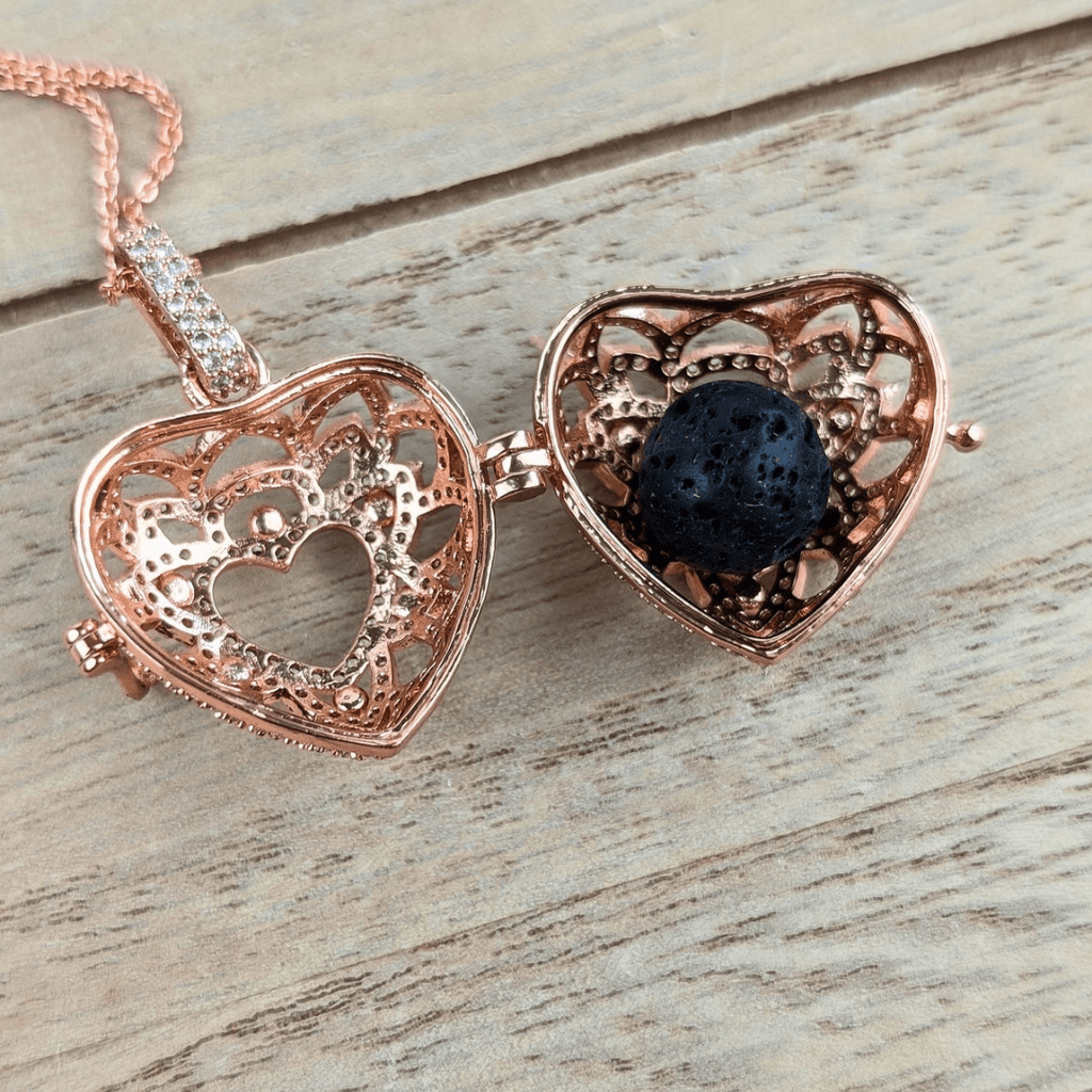 Elegant heart-shaped rose gold aromatherapy necklace