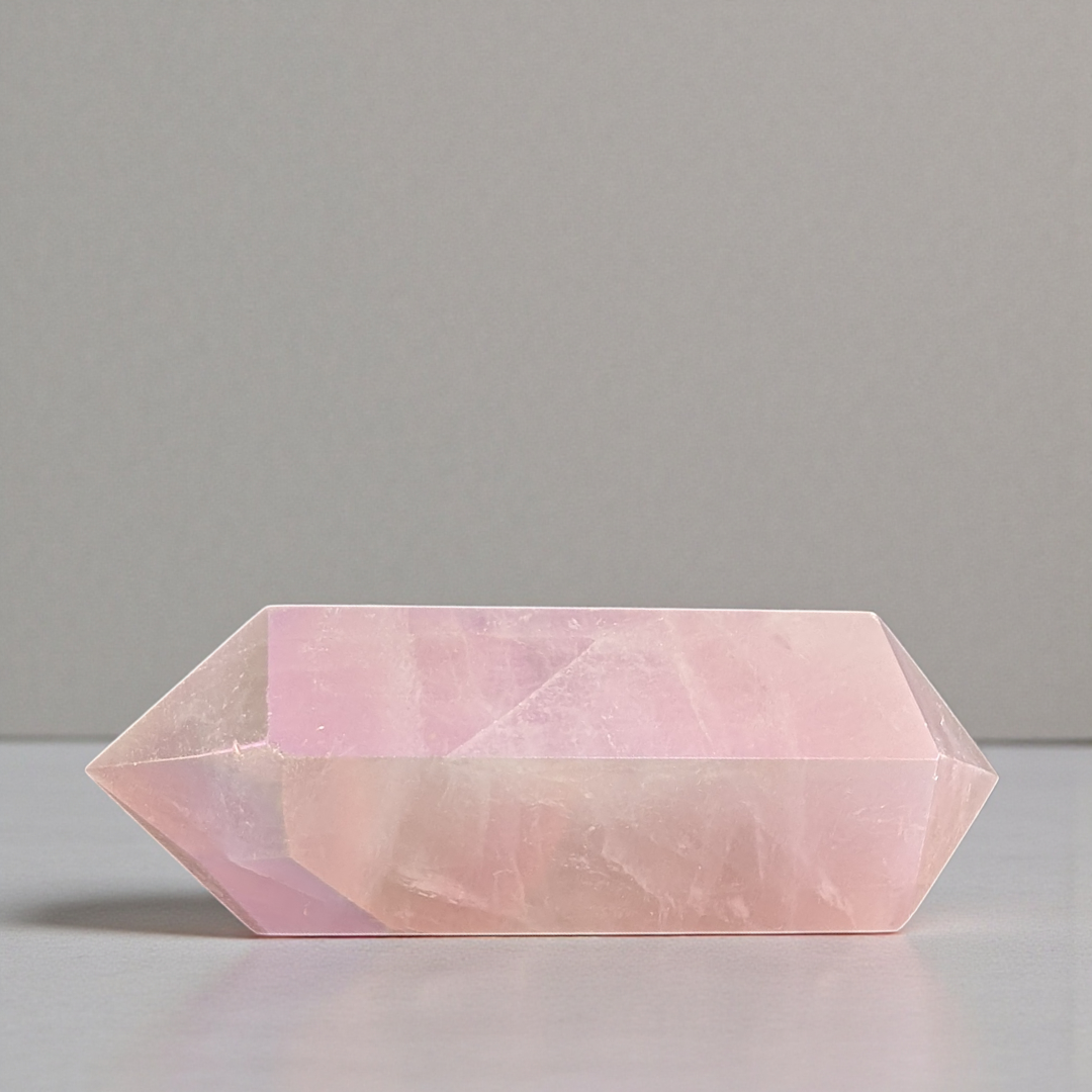 Heart chakra crystals like Rose Quartz crystal point available at zen collection crystal stores in Barrie