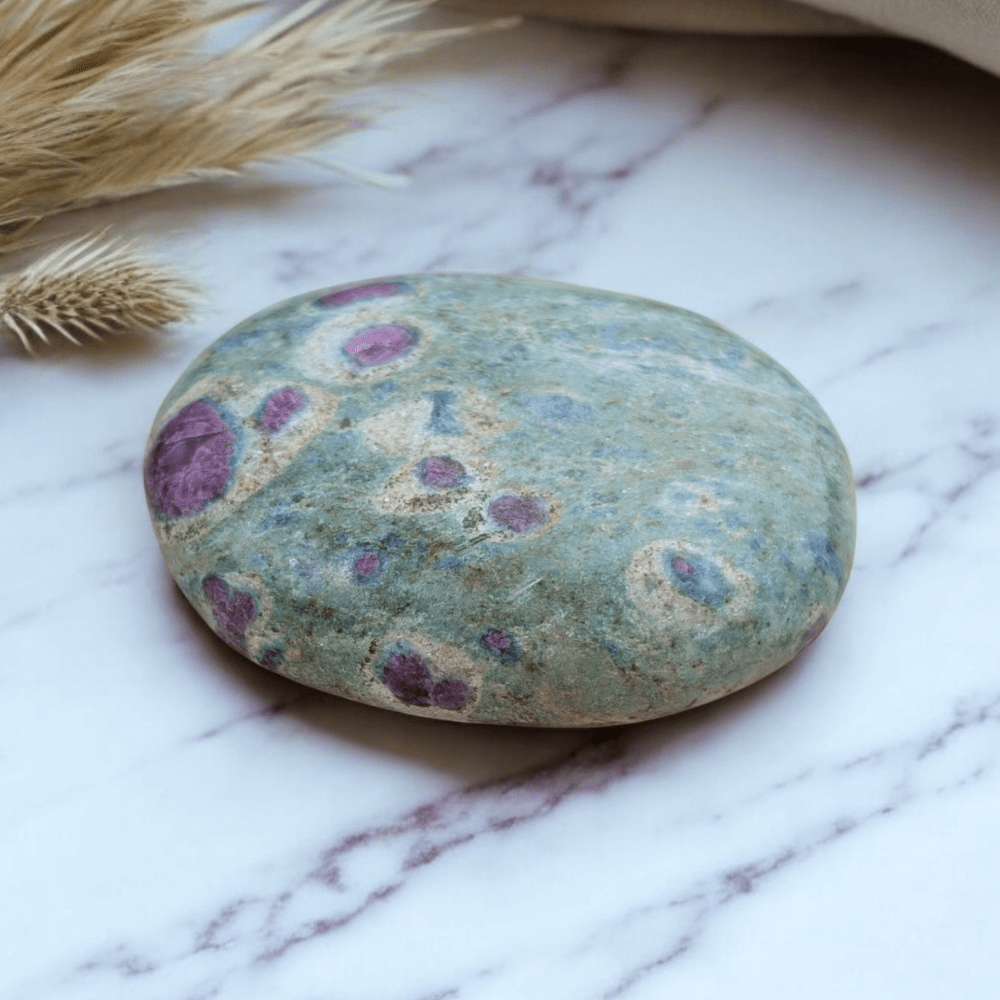 Contrasting colors of red and green in Ruby Fuchsite Palm Stone