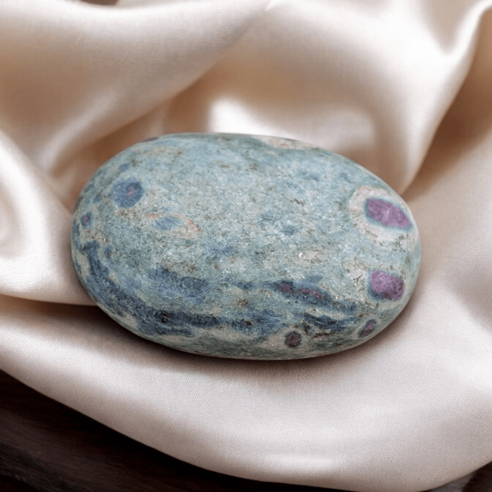 Red color Ruby inclusions in green fuchsite crystal