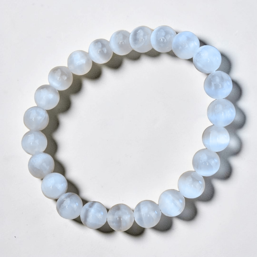 Selenite bracelet worn on left wrist for energy alignment