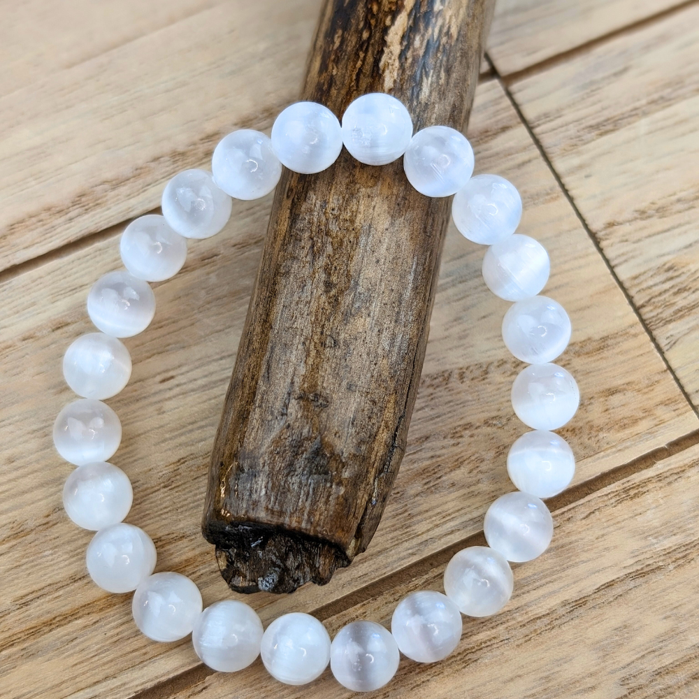 Selenite bracelet worn on left wrist for energy alignment