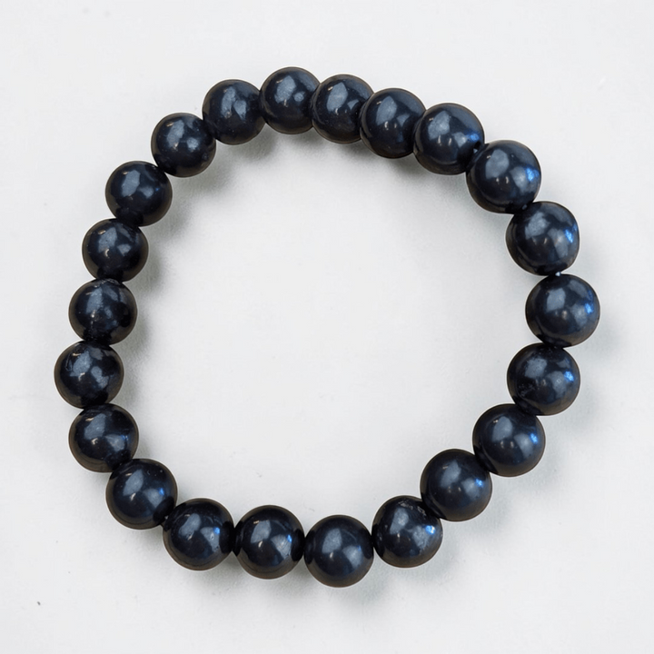 Shungite bracelet for root chakra support. Available in-store or online at Zen Collection Metaphysical Store in Barrie