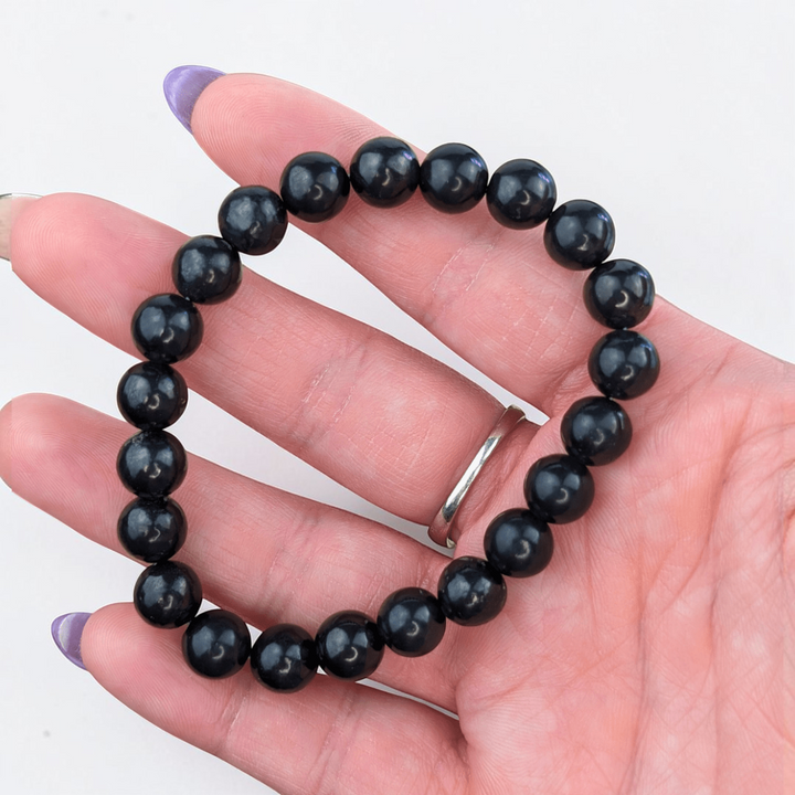 Shungite bracelet for root chakra support. Available in-store or online at Zen Collection Metaphysical Store in Barrie