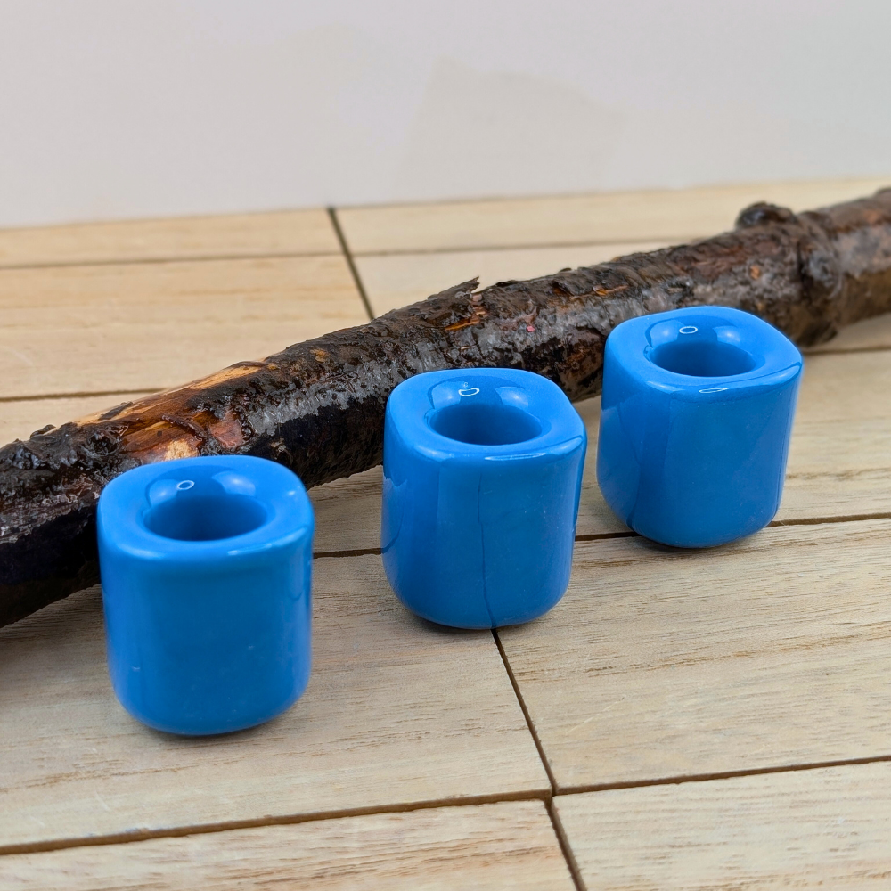 Glossy blue candle holder for spiritual practices